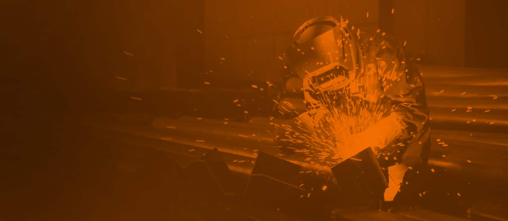 industrial welder welding metal profiles